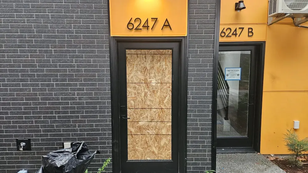 Emergency residential board up service for a damaged door in Kent, WA.